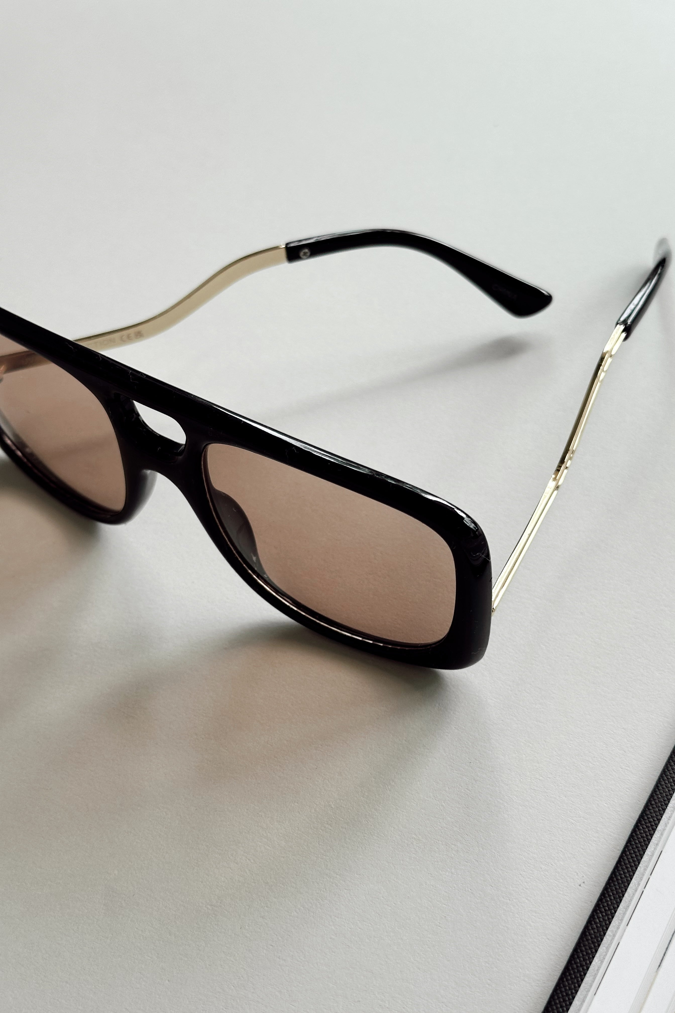 Kennedy Sunglasses in Black & Brown - flat lay - front/top view
