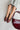 Mia Bali Burgundy Jelly Flats - top view on model