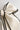 Close up view of Felicity Hair Bow Barrette in Ivory/Black which features ivory fabric with black fabric trim, double bow with a french barrette clip