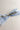 Back view of the Amelia Sheer Hair Bow Barrette in Light Blue which features light blue sheer fabric, light blue satin trim, double bow with a french barrette clip.