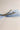 Back view of the Amelia Sheer Hair Bow Barrette in Light Blue which features light blue sheer fabric, light blue satin trim, double bow with a french barrette clip.