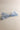 Front view of the Amelia Sheer Hair Bow Barrette in Light Blue which features light blue sheer fabric, light blue satin trim, double bow with a french barrette clip.