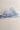 Close up view of the Amelia Sheer Hair Bow Barrette in Light Blue which features light blue sheer fabric, light blue satin trim, double bow with a french barrette clip.