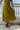 close up of hemline - Calypso Moss Green Botanical Halter Midi Dress