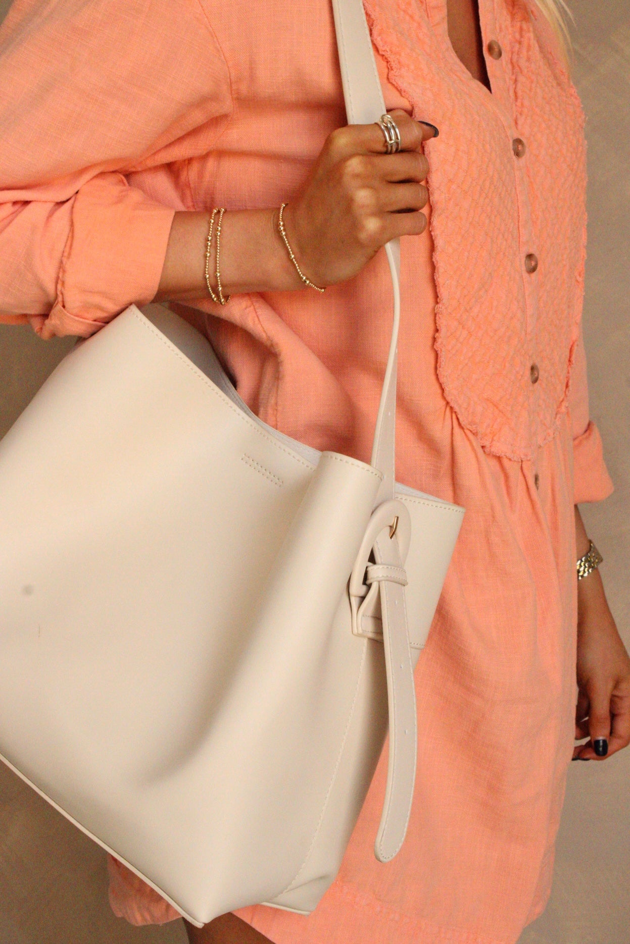 Rory Cream Faux Leather Shoulder Purse - close side view on shoulder