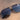 Regan Sunglasses in Black & Blue - close up flat lay