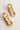 Flat lay detailed view the Lyla Neutral Tortoise Chain Link Earring which features tan and white tortoise chain links together.