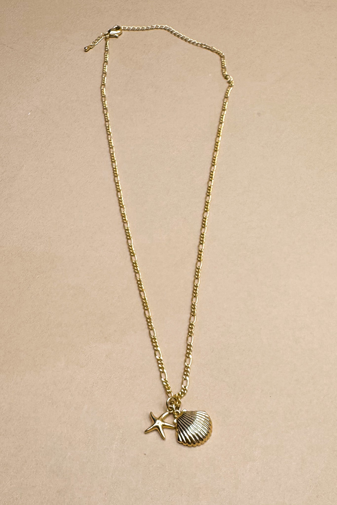 Emma Gold Seashells & Pearl Necklace- flat lay view