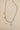 Grace Ivory & Gold Charm Necklace- close up front view