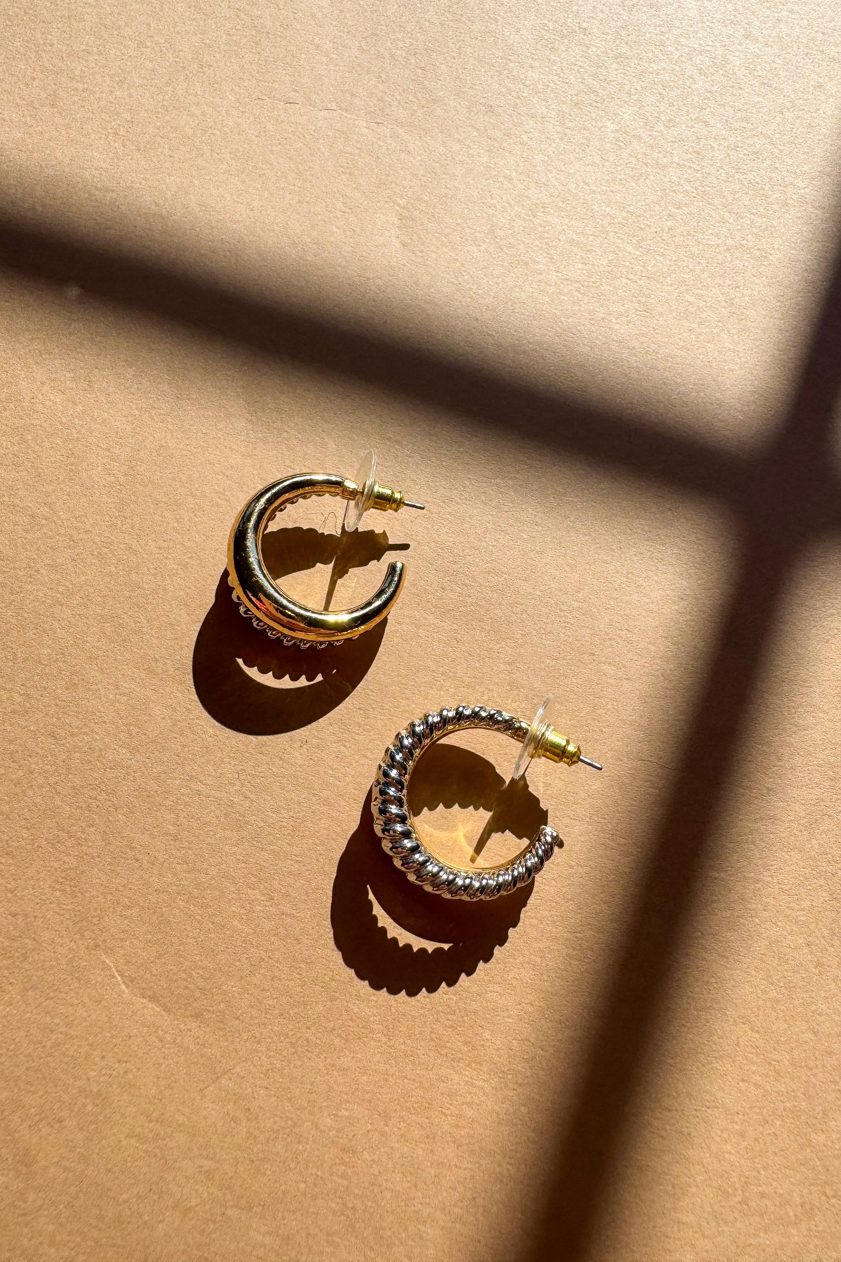Harmony Silver & Gold Hoop Earrings - flat lay - close up side views