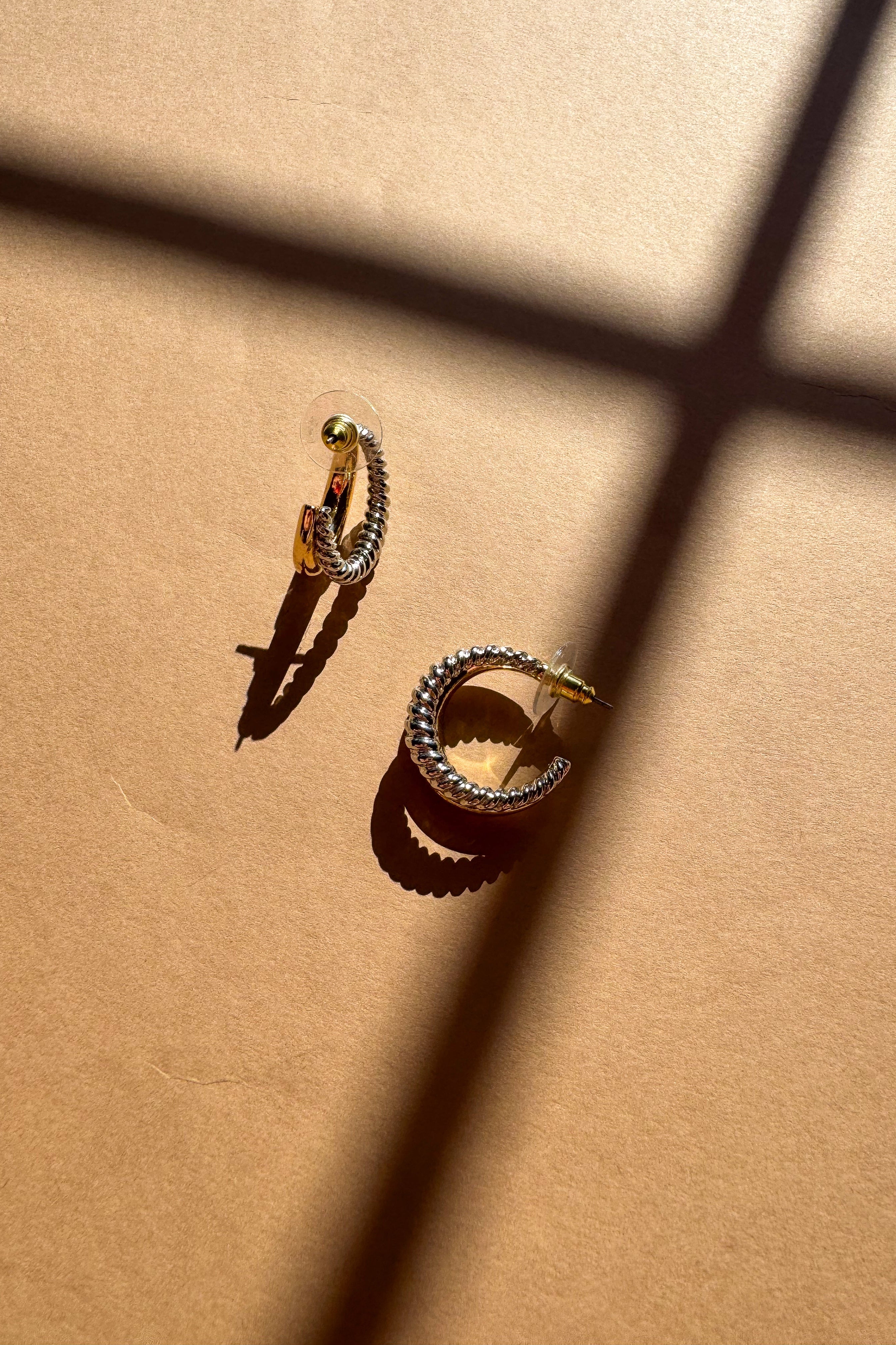 Harmony Silver & Gold Hoop Earrings - flat lay close up