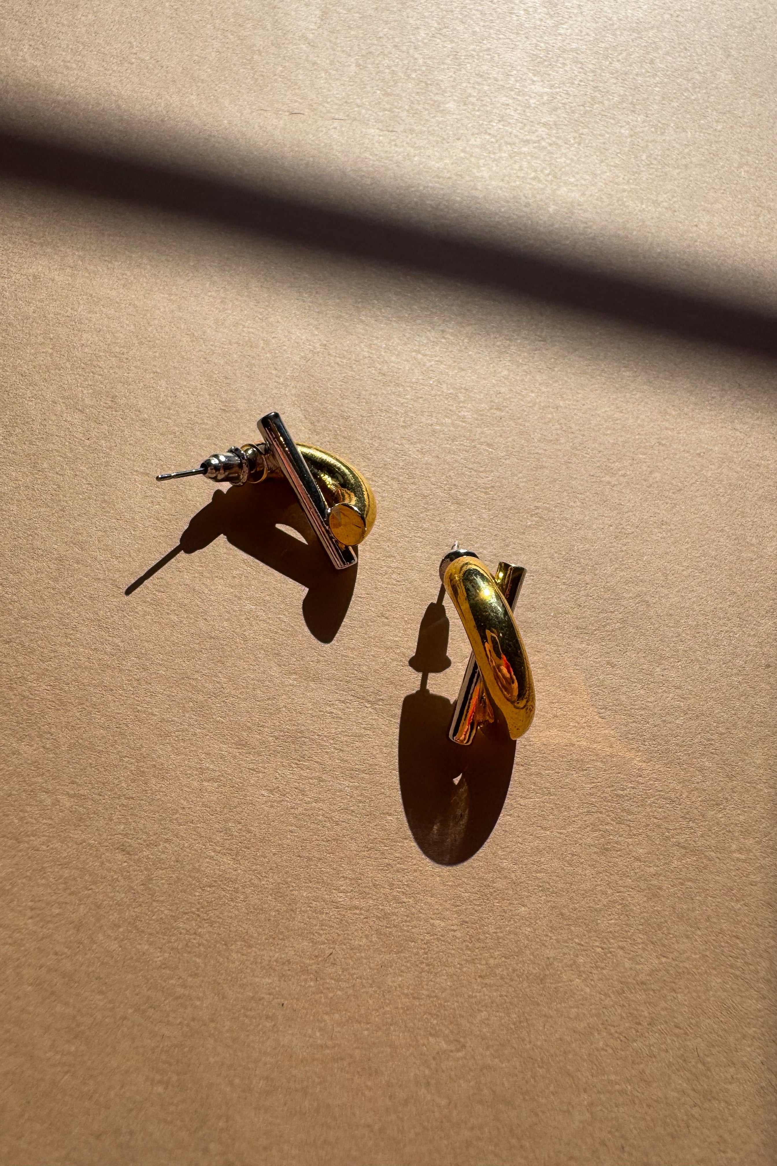 Greer Gold & Silver Criss Cross Stud Earrings - flat lay top/back view