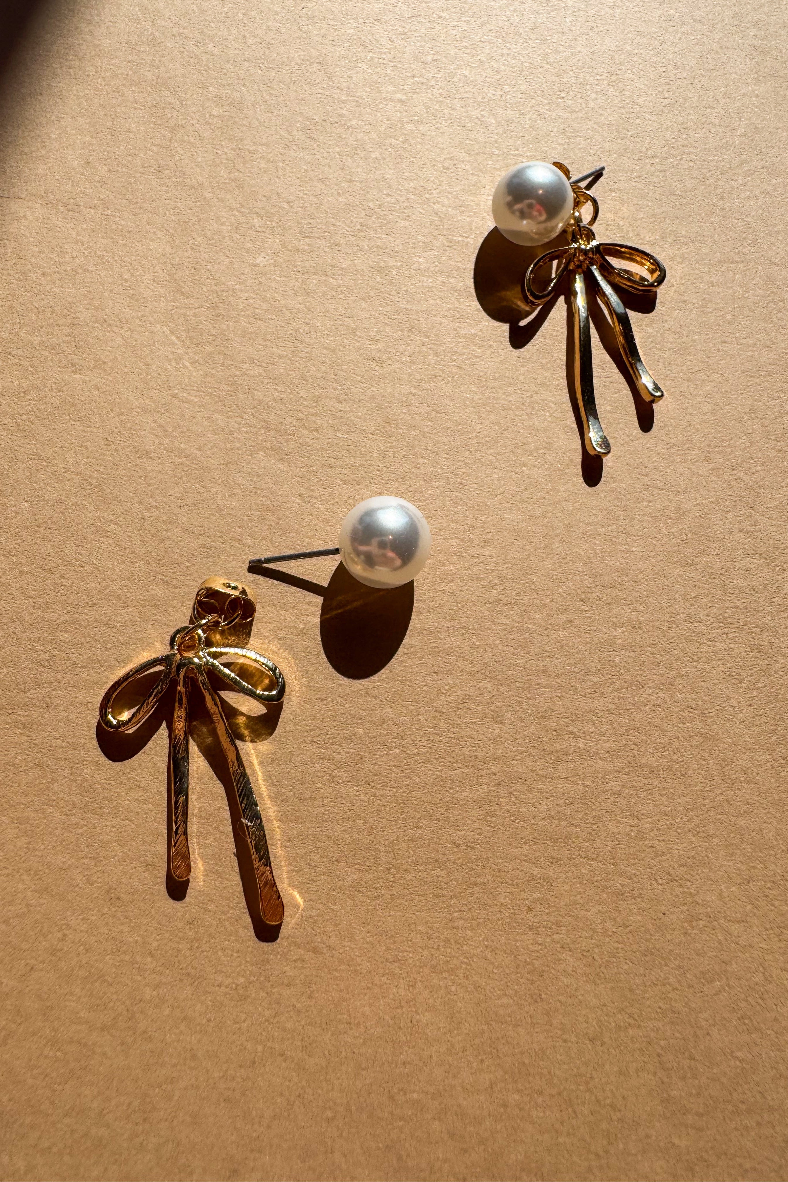 Vanessa Gold Bow & Pearl Earrings - flat lay top