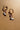 Kimberly Cowgirl Boot Huggie Earrings - flat lay close up