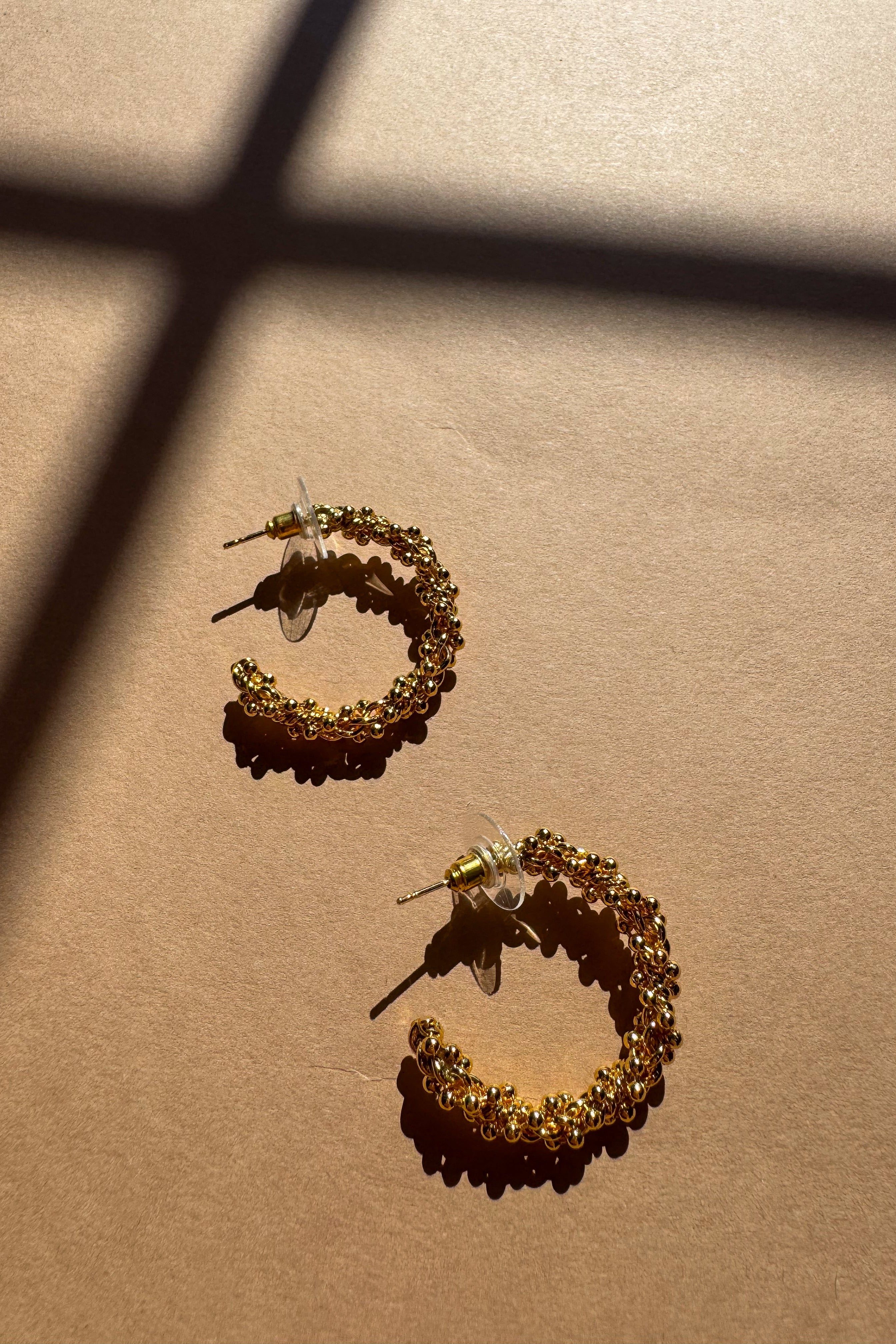 Rachel Gold Plated Beaded Hoop Earrings - top view flat lay