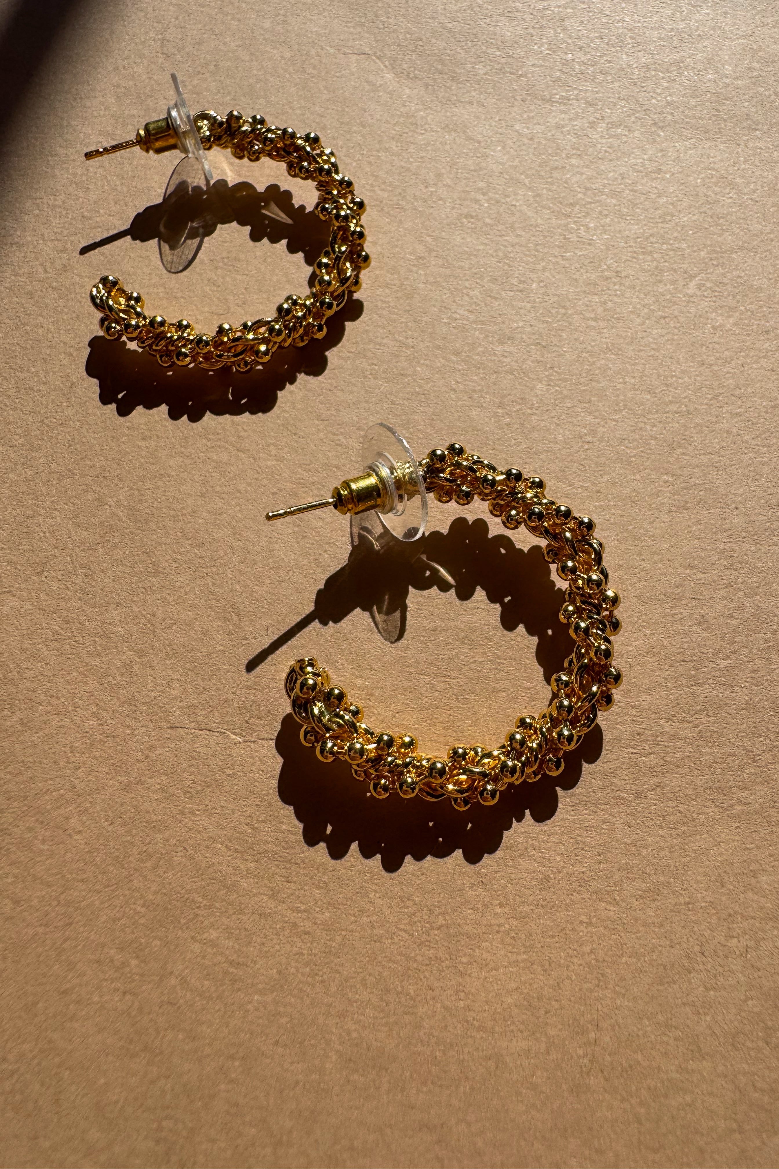 Rachel Gold Plated Beaded Hoop Earrings - close up flat lay