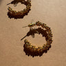 Rachel Gold Plated Beaded Hoop Earrings - close up flat lay