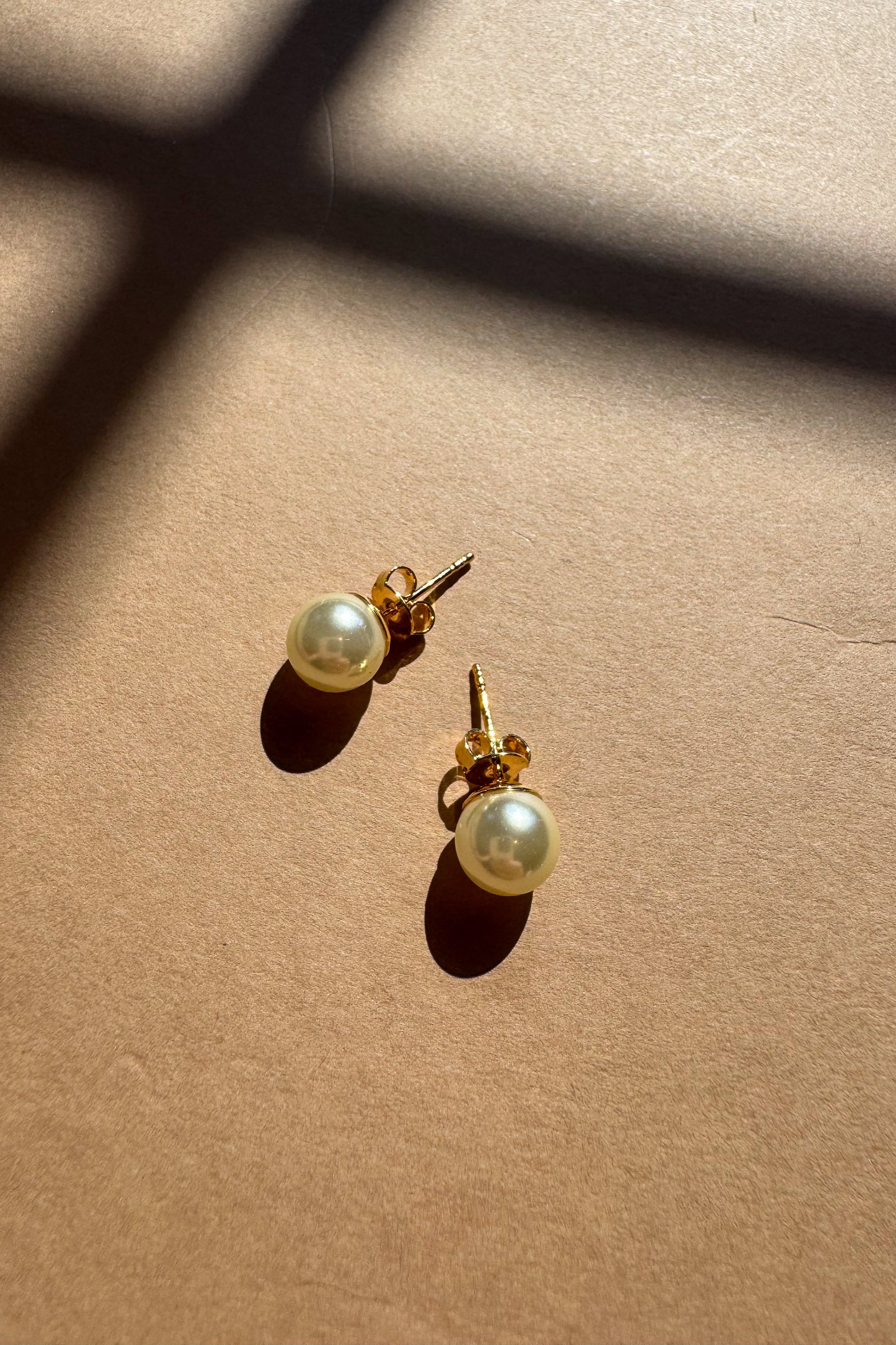 Valencia Gold Filled Pearl Stud Earrings - flat lay top view
