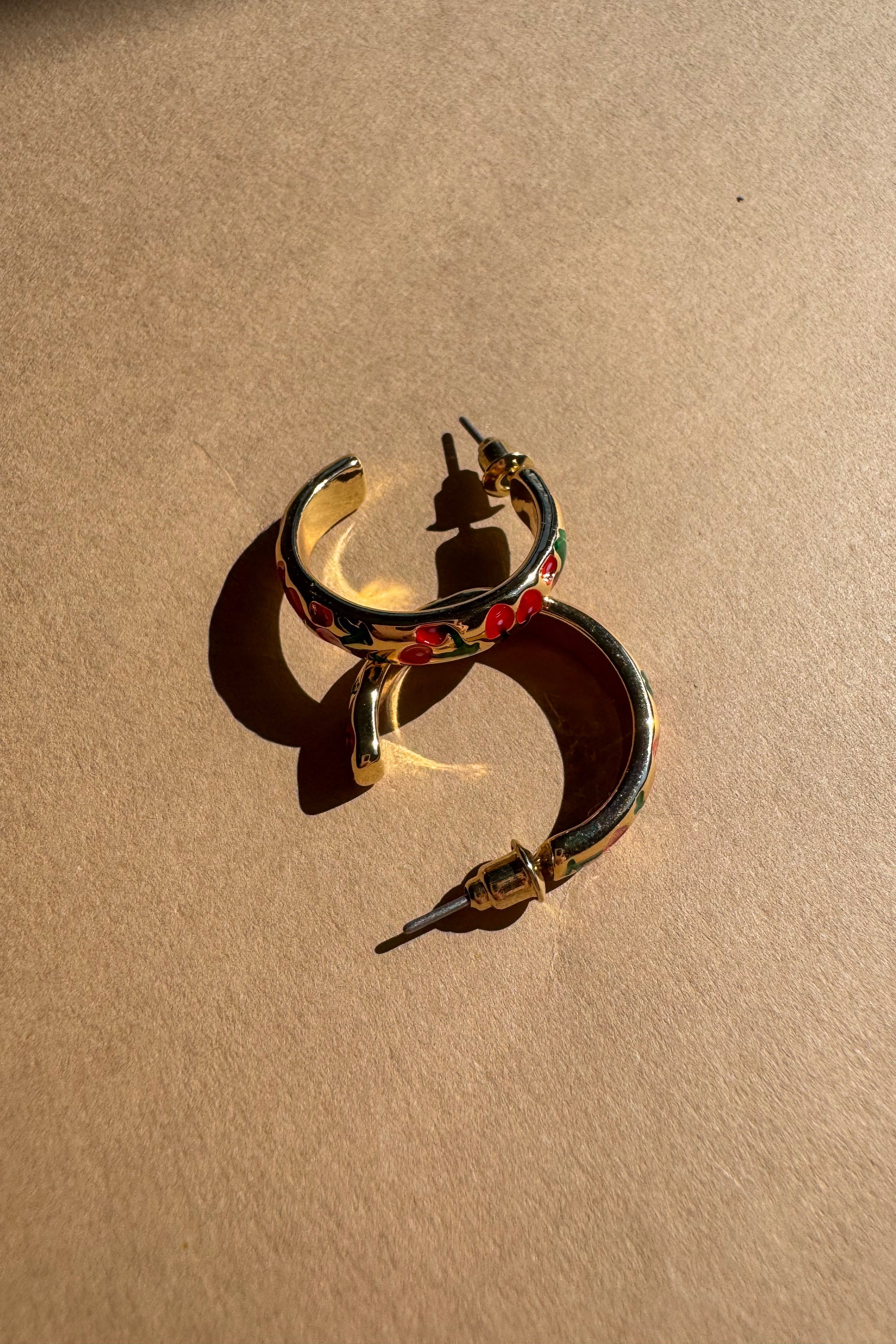 Dana Gold Cherry Hoop Earrings - flat lay close up