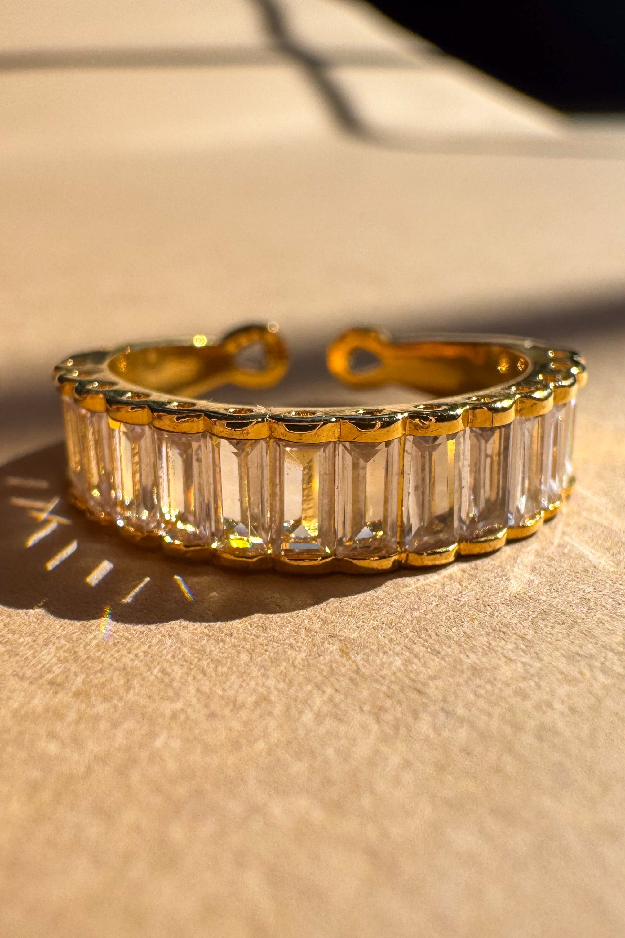 Rima Clear Stone Gold Dipped Ring - close up front view
