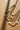 Nyla Gold & Pearl Layered Cross Necklace - close up flat lay