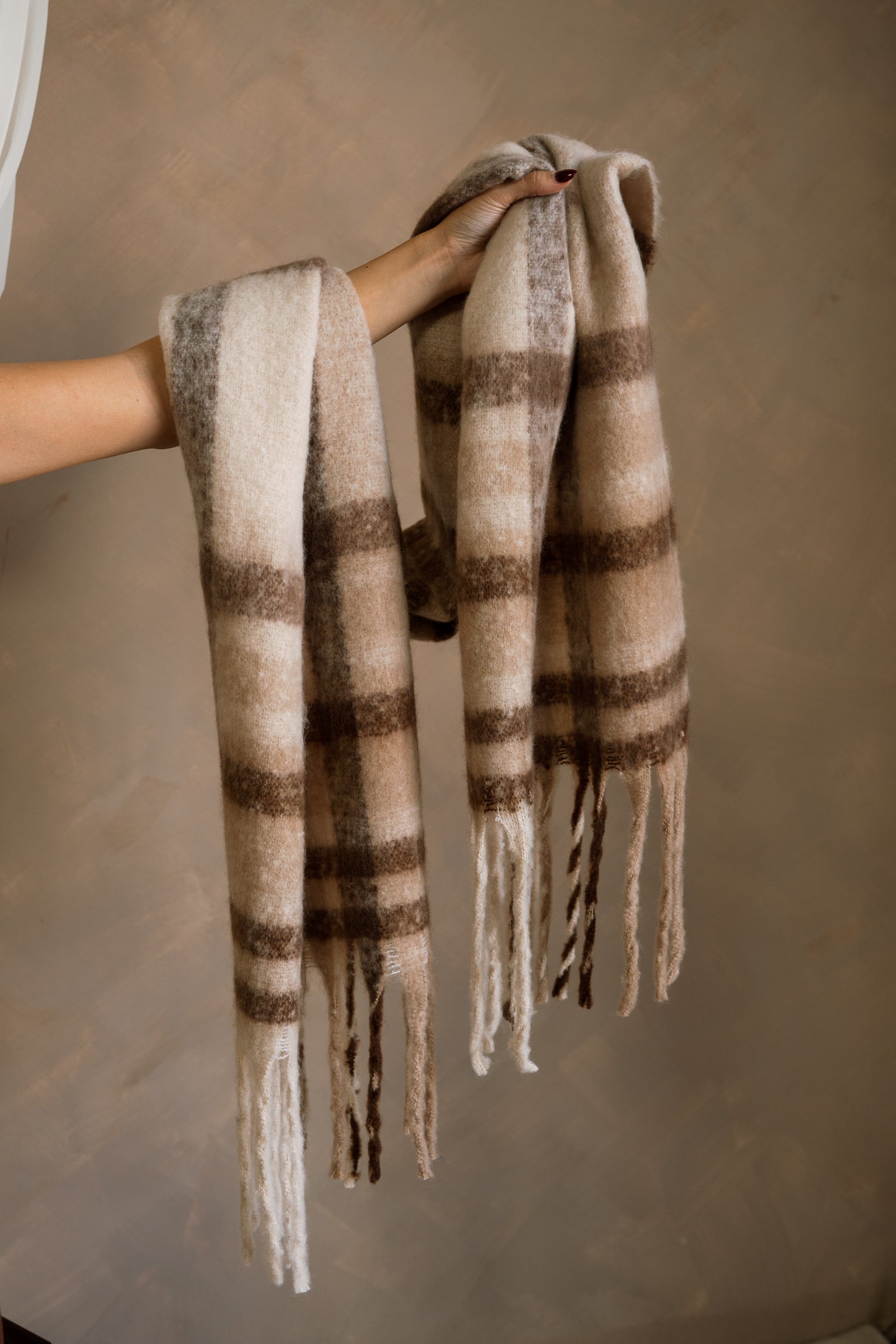 Jordan Beige & Brown Plaid Fringe Scarf - draped over model's arm