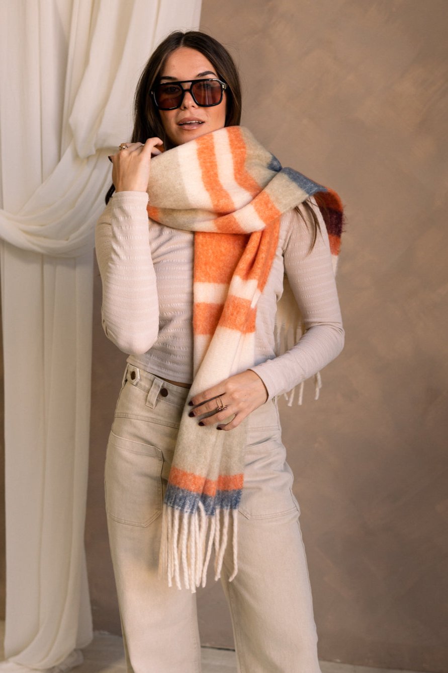 Rylie Orange Striped Fringe Scarf - wrapped around model's neck