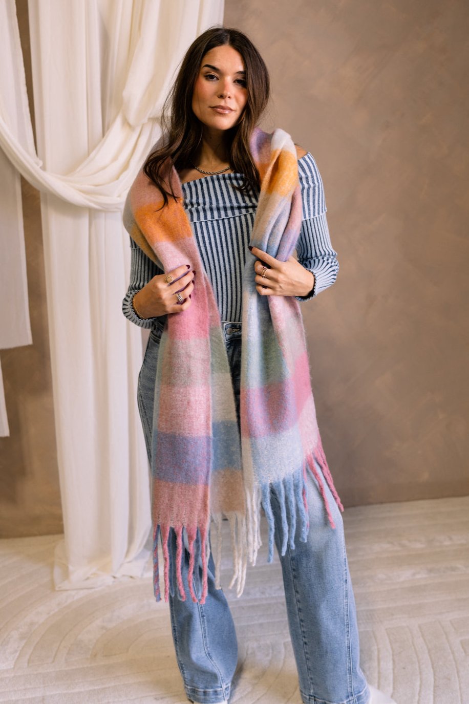 Maren Plaid Fringe Scarf - Pink - Draped front view on model