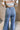 Angela Medium Wash Flare Jeans - close up back view