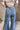 Angela Medium Wash Flare Jeans - close up back view