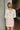 Alora Cream Back Bow Long Puff Sleeve Top- back view