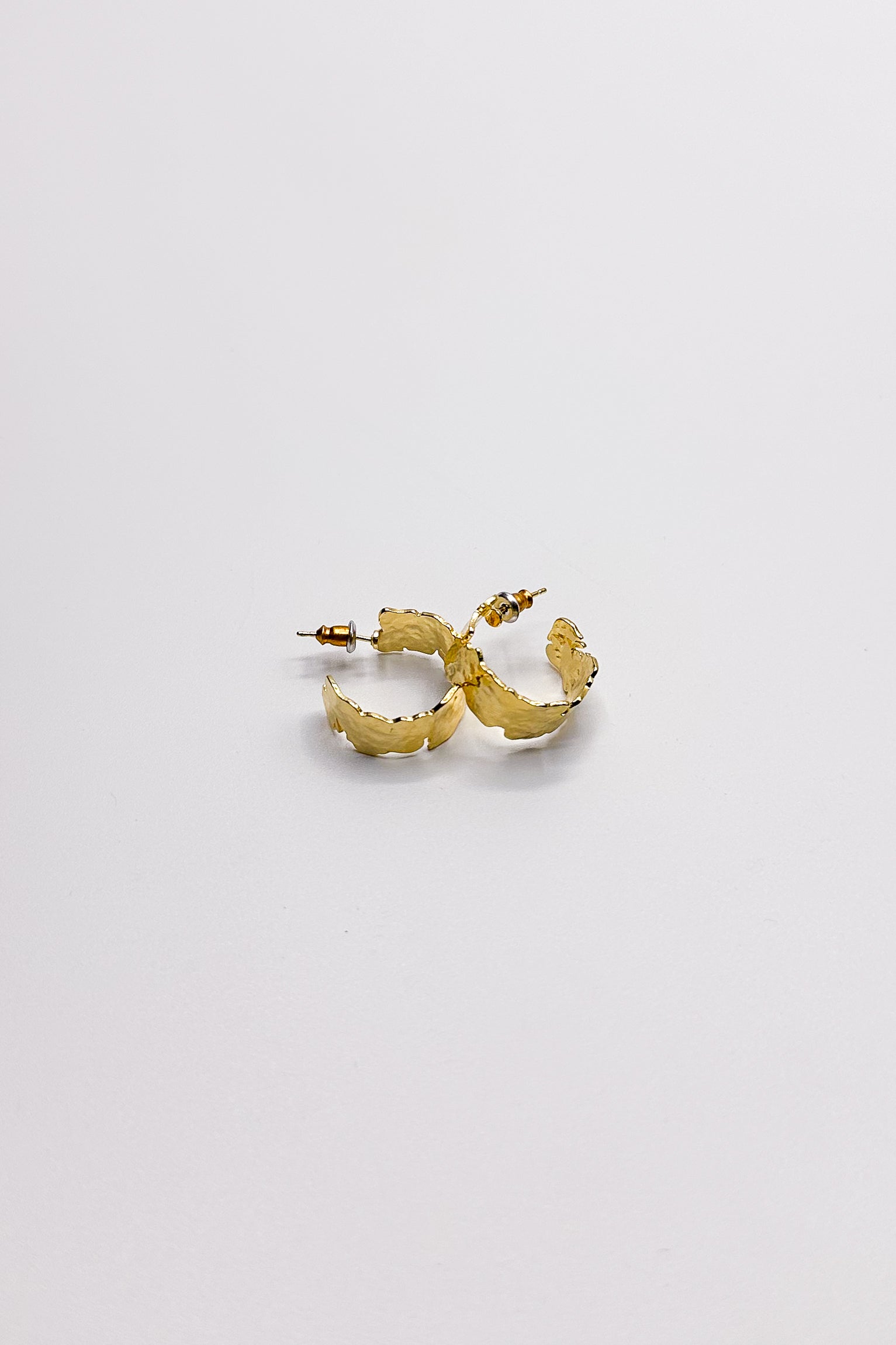 Laurel Gold Hammered Hoops Earring- close up view