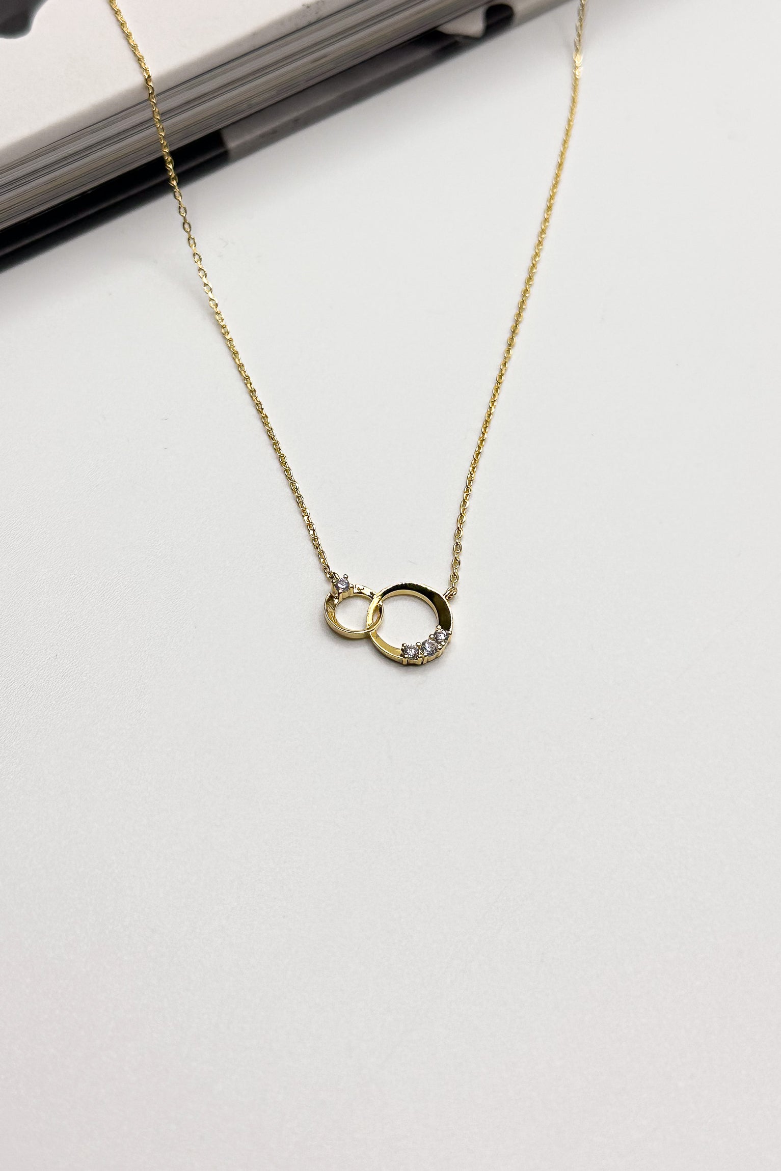 Emryn Gold Dipped Double Circle Necklace- close up view