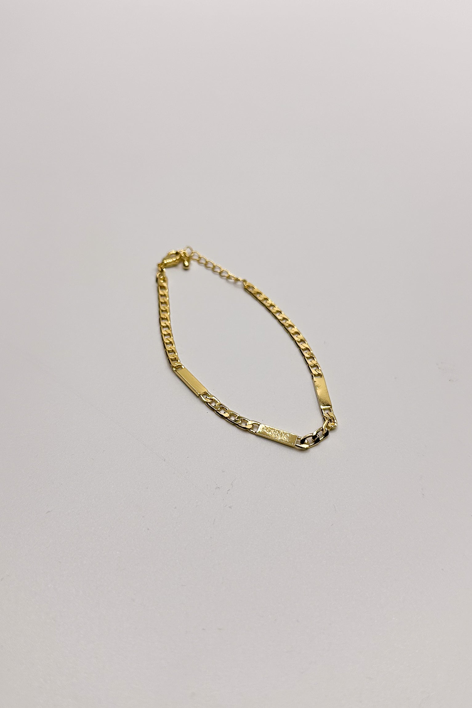 Ellie Gold Dipped Chain Bracelet- flat lay view