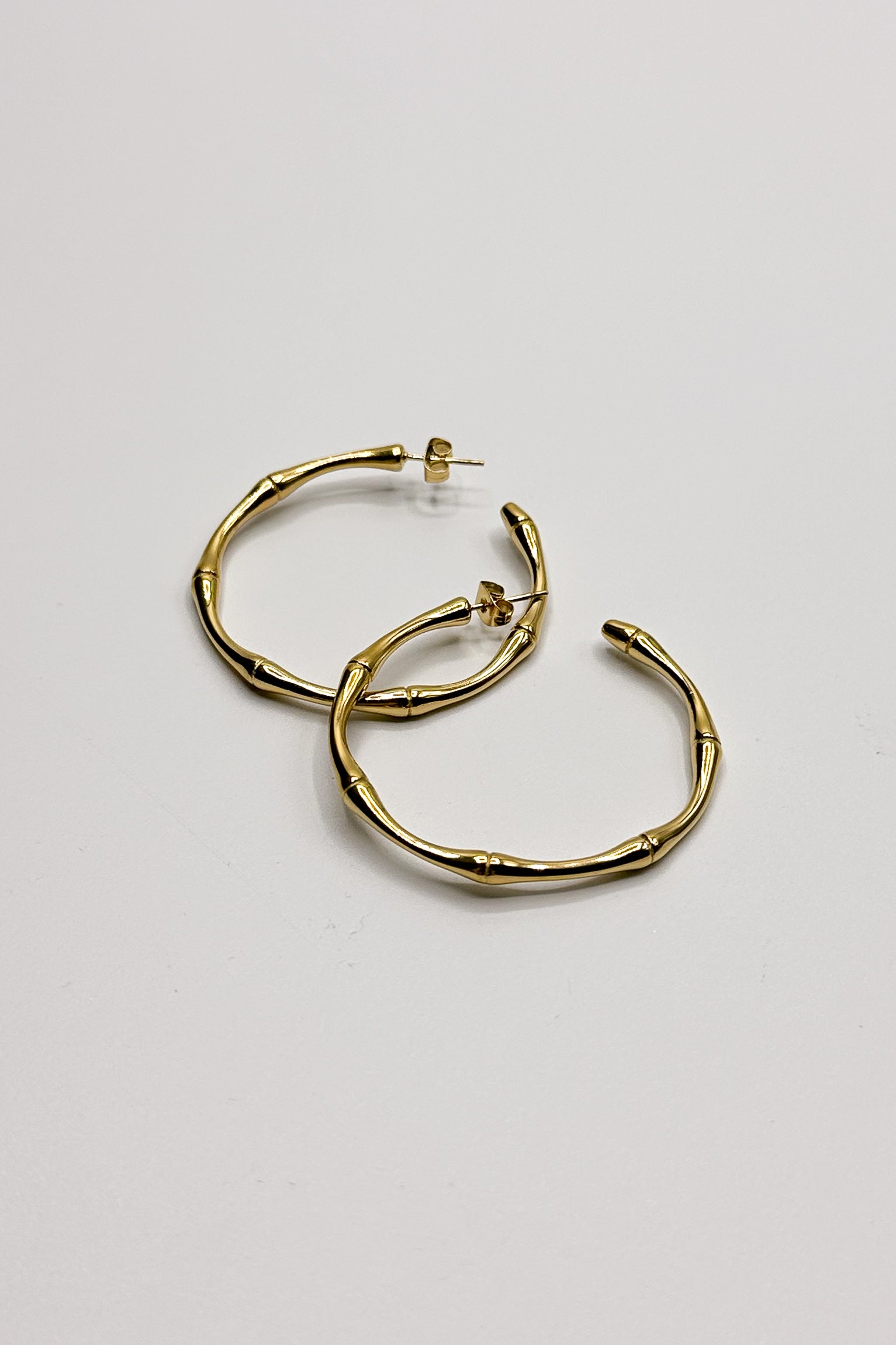 Lola Gold Bamboo Hoop Earring- close up flat view