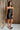 Melody Black Faux Leather Mini Dress- full body side view