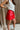 Mila Red Leather Cargo Skort- close up side view