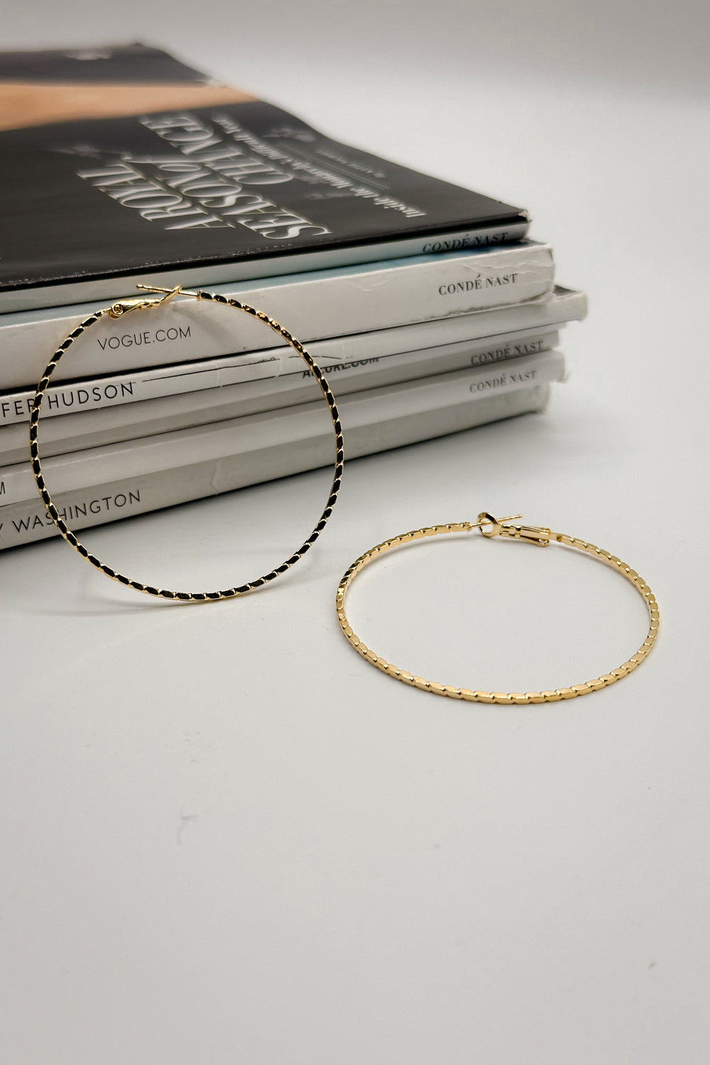 Melania Gold Textured Closed Hoops Earring- close up view