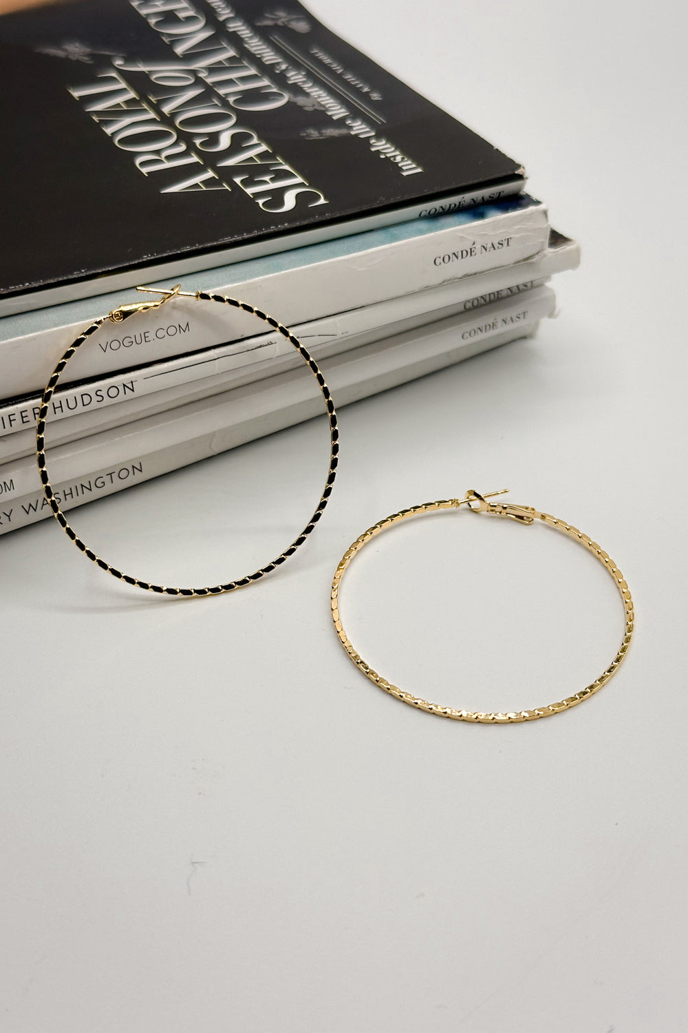 Melania Gold Textured Closed Hoops Earring- close up front view