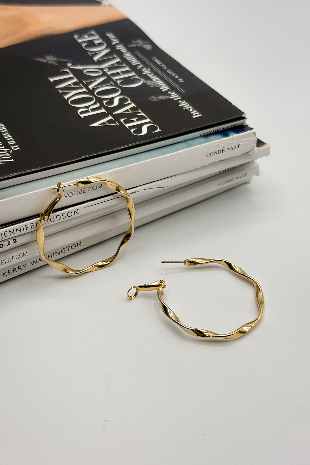 Justine Gold Wave Closed Hoops Earring- close up view