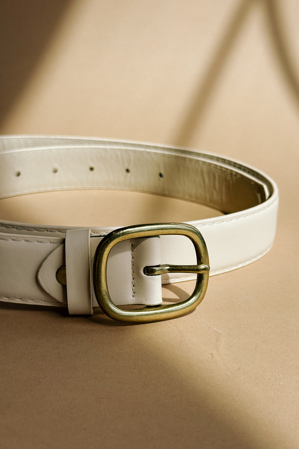 Gianna White & Brushed Gold Buckle Belt- flat lay view