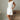 Reign White Denim Belt Mini Dress- full body side view