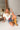Shiloh Medium Wash Belted Denim Shorts - frontal sitting view