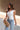 Reyna Cream Sunburst Split Hem Top - frontal side view