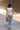 Reyna Cream Sunburst Split Hem Top - full back view