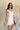 Delilah White Scallop Mini Dress - frontal side view
