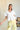 Daisy White V-Neckline Flare Top- front view