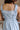 Bella Light Blue Ruffled Romper - close up back view