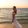 Bristol White Eyelet Off-The-Shoulder Midi Dress - side view on 5'4 model