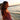 Miranda Dark Mauve Gauze Maxi Dress- upper side view on beach